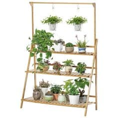 Decorative wooden plant shelf for indoor gardening and home decor.