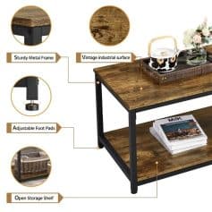 Elegant industrial style coffee table with sturdy metal frame and vintage wood surface, featuring adjustable foot pads and open storage shelf, perfect for living room decor.
