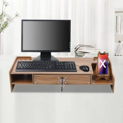 Clean and modern office desk with a computer monitor, keyboard, mouse, and a smartphone on a wooden stand, perfect for efficient workspace organization and stylish optometry clinic setup.