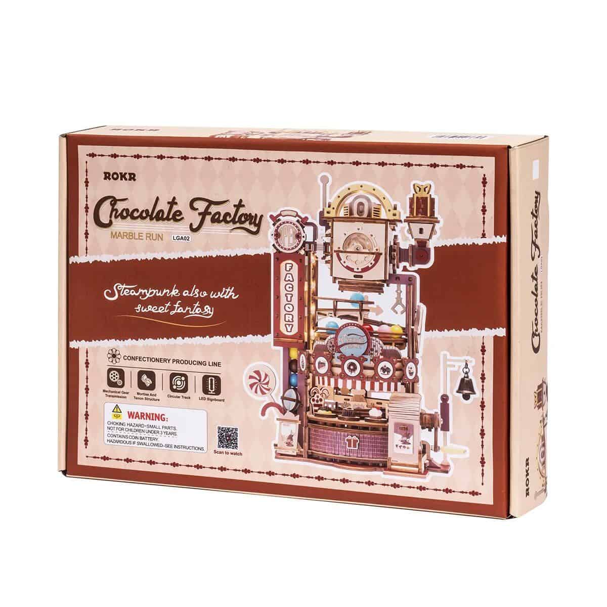 Colorful mechanical chocolate factory toy for kids, featuring intricate design and LED lights, perfect for interactive play and educational fun.
