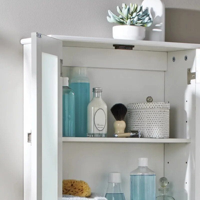 Bright white optician storage cabinet with skincare and contact lens accessories.