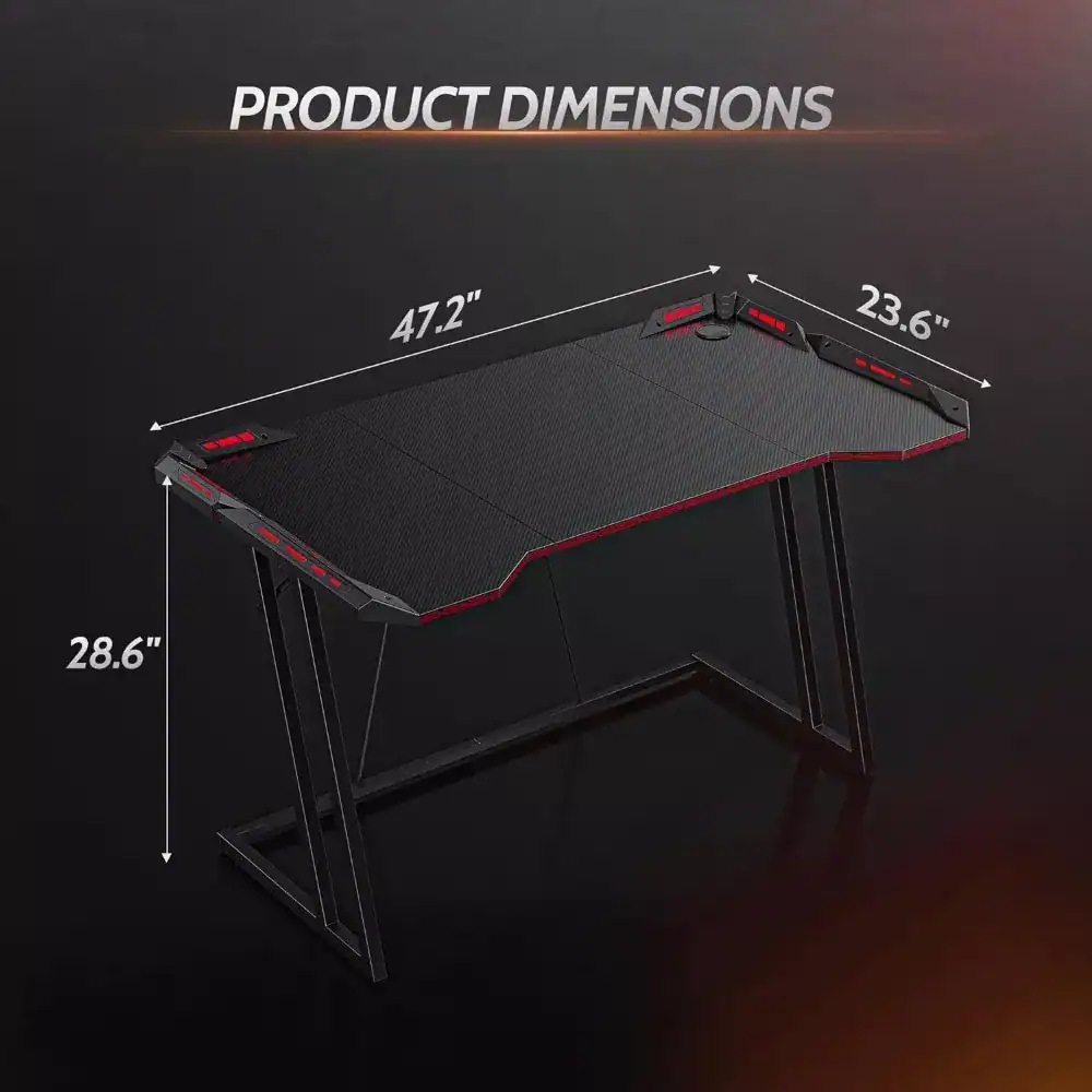 Stylish gaming desk with dimensions 47.2" x 23.6" x 28.6" for optimal gaming setup and workspace. Durable surface perfect for monitors, keyboards, and accessories.