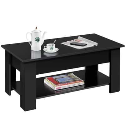 Stylish black coffee table with magazines and tea set on top, perfect for living room decor. Durable wood design enhances modern aesthetics and provides functional storage space underneath.