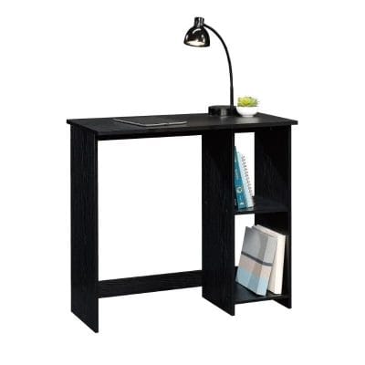 Minimalist black desk for home or office with built-in bookshelf and adjustable LED desk lamp for optimal workspace lighting.