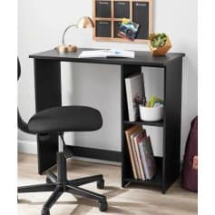 A sleek black desk ideal for optometry offices or study spaces, featuring a lamp, books, notebooks, and organized shelves for eyewear or supplies. Perfect for professional or personal use.
