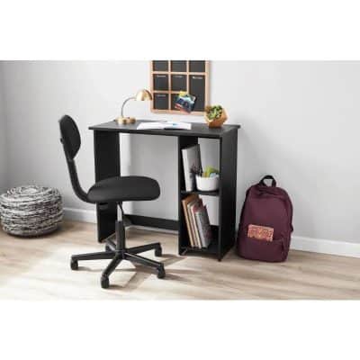 A sleek black office desk with a comfortable ergonomic chair, perfect for optical clinics or optometry offices. Features storage shelves, a desktop organizer, and a stylish decor accent, ideal for professional eyewear shops.