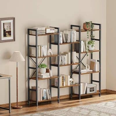 A sleek black and wood bookshelf filled with books, decorative items, and plants adds contemporary elegance to the living room or office space.