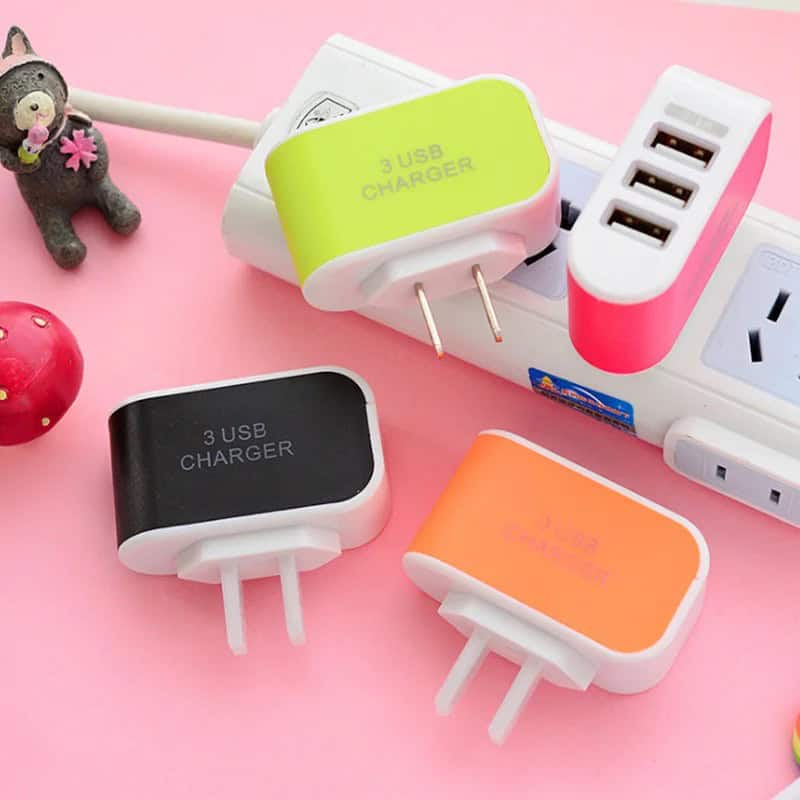 Portable 3 USB charging station, multi-color quick charger for smartphones and tablets, compatible with various devices. Ideal for home or travel to keep your gadgets powered.