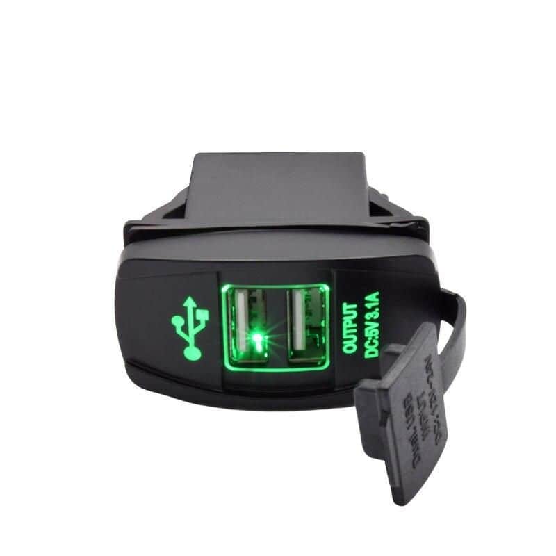 Compact portable charging port with dual USB output for devices. Features green LED indicators for easy use. Ideal for on-the-go power needs, ensuring your electronic devices stay charged anytime.