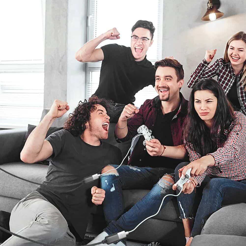 Vibrant scene of friends enjoying arcade gaming experience at Monalisa Store with energetic atmosphere and gaming excitement.