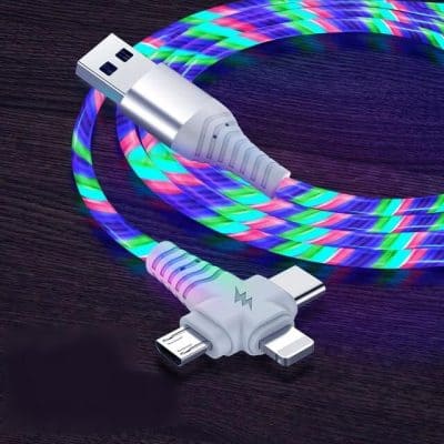 Colorful LED-lit USB charging cable with multi-functional connectors on a wooden surface. Perfect for fast charging and data transfer for various devices.