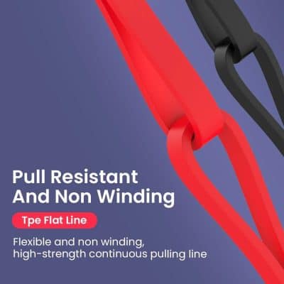 Close-up of a red and black pull resistor with flexible, non-winding design for electronic circuits.