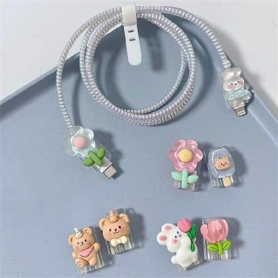 Colorful adorable animal and flower-themed USB cable accessories, perfect for kids and teens, adding a fun and decorative touch to your electronic devices. Made with safe, high-quality materials.