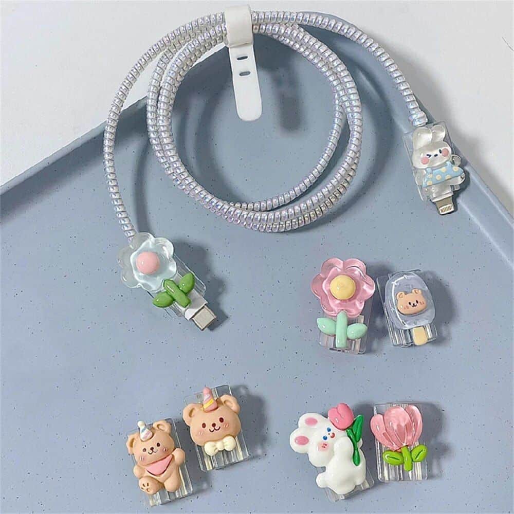 Colorful adorable animal and flower-themed USB cable accessories, perfect for kids and teens, adding a fun and decorative touch to your electronic devices. Made with safe, high-quality materials.