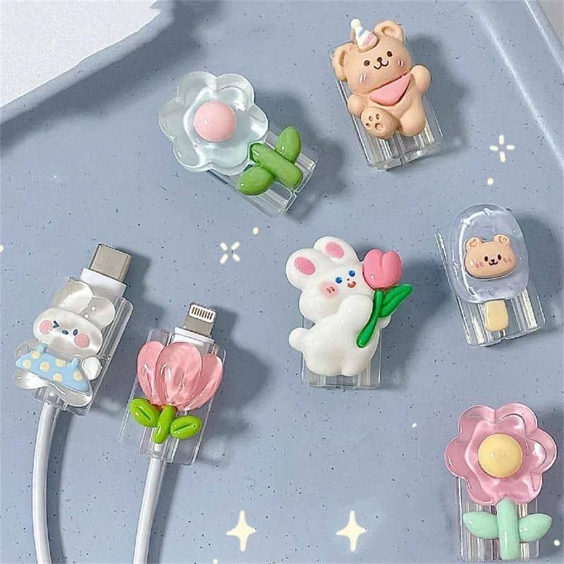 Adorable bunny and bear cable protectors with pastel colors, perfect for decorating charging cables and preventing damage, suitable for kids and teens.