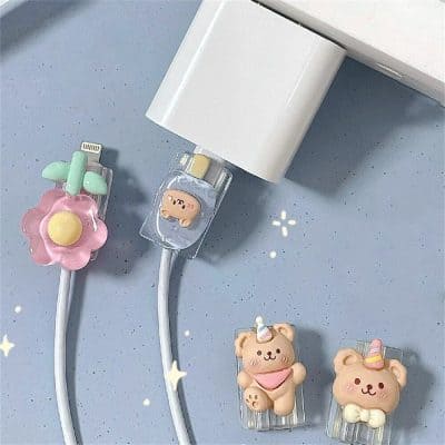 Colorful cute bear and flower cable clips for easy cable management and decoration. Perfect for keeping charging cables organized at home or in the Office, with adorable cartoon designs.