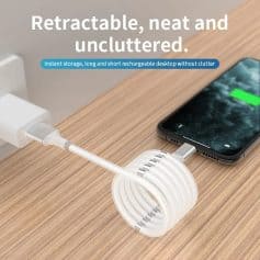 A neat, retractable desktop organizer designed for keeping electronic accessories tidy, perfect for use with smartphones, chargers, and cables, ensuring clutter-free workspace.