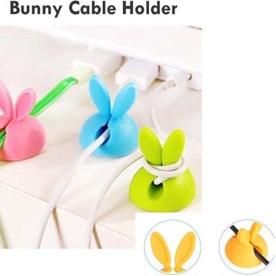 Colorful bunny-shaped cable organizer for desk or bedroom, ideal for keeping cables neat and tangle-free. Fun and practical accessory, perfect for home or office use.