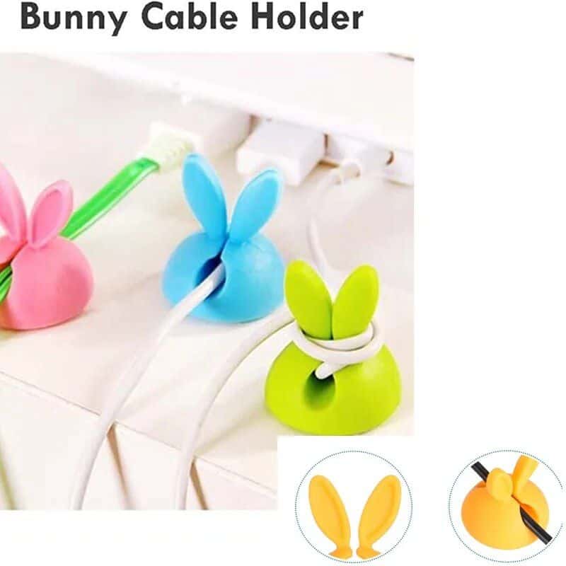 Colorful bunny-shaped cable organizer for desk or bedroom, ideal for keeping cables neat and tangle-free. Fun and practical accessory, perfect for home or office use.