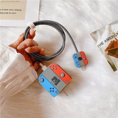 Portable Nintendo Switch power adapter with customizable Joy-Con design, compatible for on-the-go charging, perfect for gaming enthusiasts.