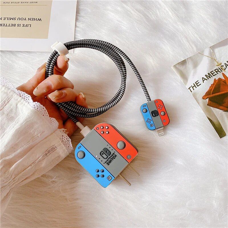 Portable Nintendo Switch power adapter with customizable Joy-Con design, compatible for on-the-go charging, perfect for gaming enthusiasts.