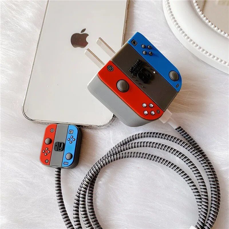 High-quality gaming accessories, Nintendo Switch console, colorful controllers, and charging station for Nintendo Switch gaming system.