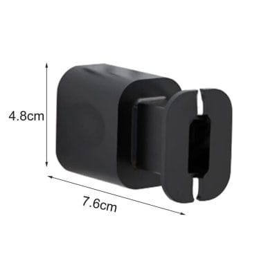 Magnetic eyeglass holder clip for sunglasses or glasses, compact black design. Keep your glasses secure and easily accessible with this practical accessory, ideal for desk, car, or home use.