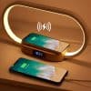 Wireless charging pad for smartphones, stylish wooden design with LED clock display. Perfect for fast and convenient charging at home or office. Compatible with all Qi-enabled devices.