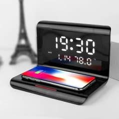 Modern digital alarm clock with charging dock, featuring large illuminated display for easy time and date viewing, perfect for bedroom or workspace, supports daily productivity and convenience.