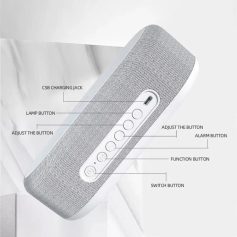 Wireless Bluetooth speaker with adjustable volume, alarm, and charging port, designed for portable audio, music streaming, and hands-free calls.