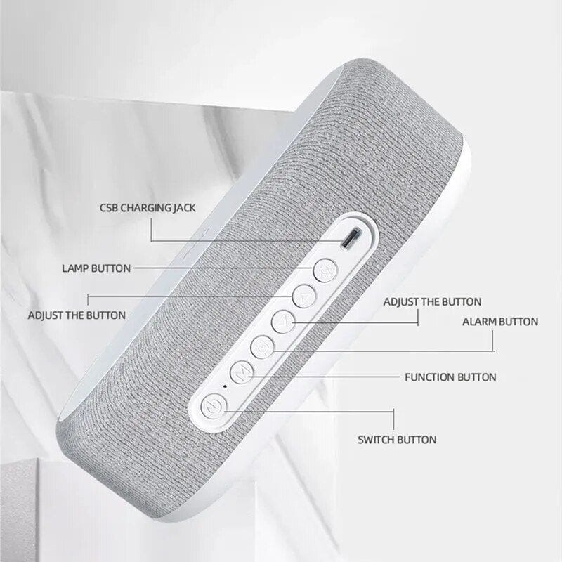 Wireless Bluetooth speaker with adjustable volume, alarm, and charging port, designed for portable audio, music streaming, and hands-free calls.
