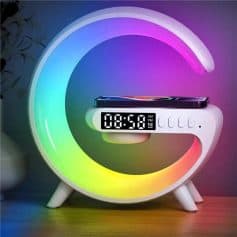 Stylish modern alarm clock featuring vibrant RGB LED lighting and wireless charging pad, perfect for a contemporary bedroom or office.