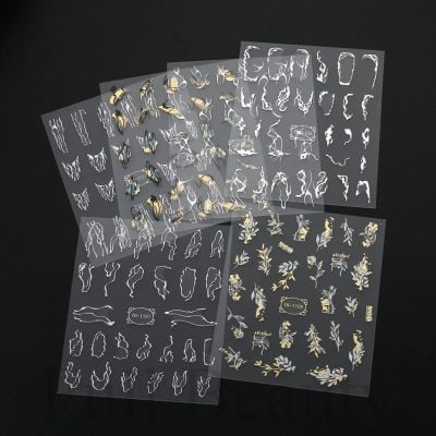 Decorative nail art stickers with floral and abstract designs for professional and salon use.