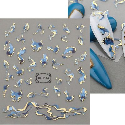 High-quality blue and gold nail decals for professional or salon use, perfect for enhancing manicure designs with a luxurious touch. Easy to apply for stunning nails.