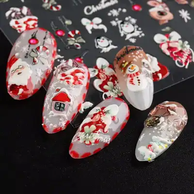 Beautiful holiday-themed Christmas nail designs with Santa, snowman, and festive motifs on nails.