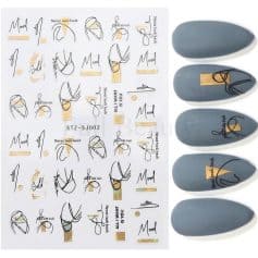 High-quality modern oval-shaped nail tips for acrylic or gel nails, featuring stylish gold and black accent designs, perfect for professional or home manicure standards.