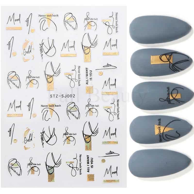 High-quality modern oval-shaped nail tips for acrylic or gel nails, featuring stylish gold and black accent designs, perfect for professional or home manicure standards.