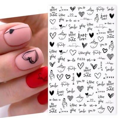 Nail art with heart and smiley face designs, perfect for stylish and expressive manicures, available at Monalisa Store for elegant and trendy nail decorations.