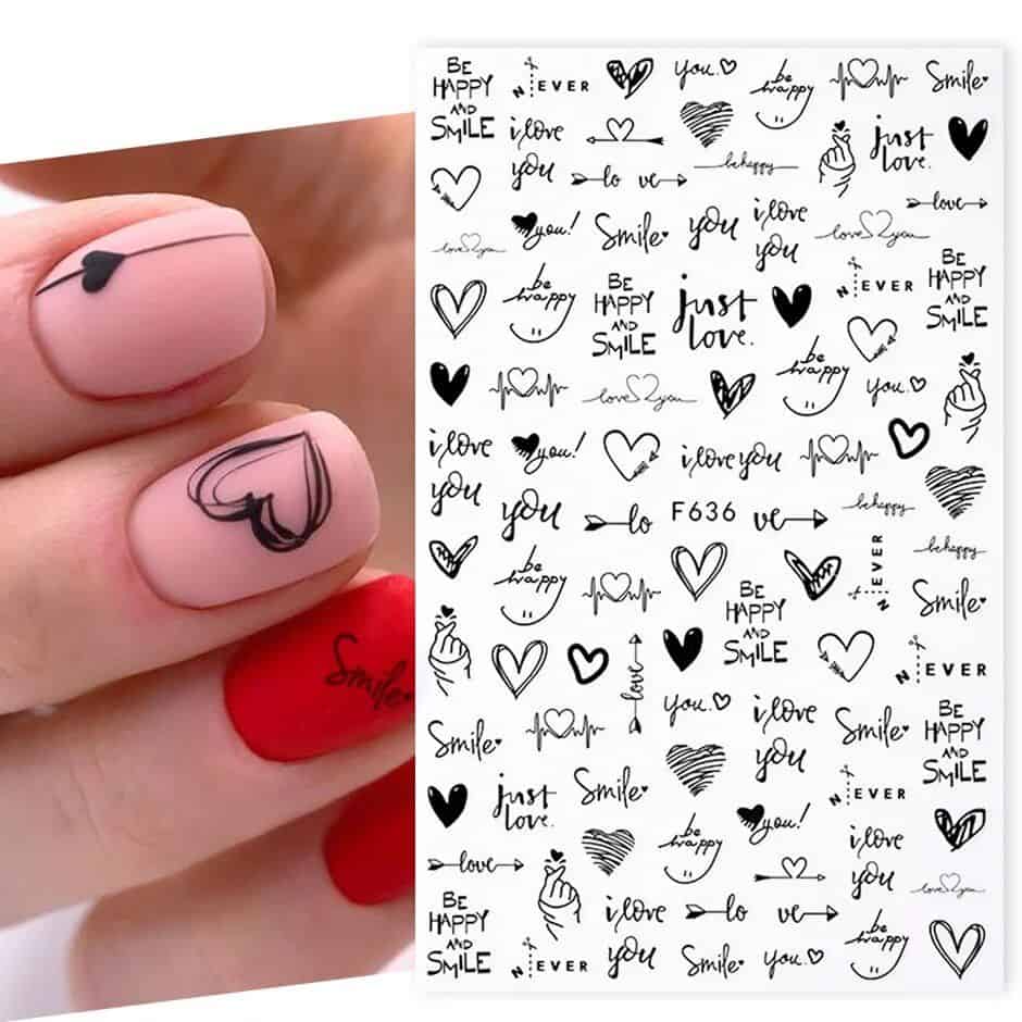 Nail art with heart and smiley face designs, perfect for stylish and expressive manicures, available at Monalisa Store for elegant and trendy nail decorations.