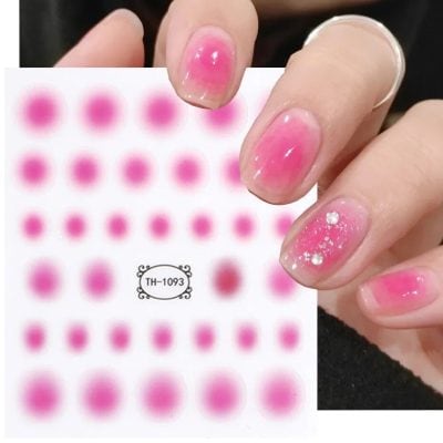 Detailed image of pink gel nail art stickers with rhinestone accents for nail enhancement and decoration. Perfect for stylish, eye-catching manicures.