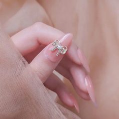 Pearl and crystal bow ring, delicate jewelry for women, adding charm to rings collection, perfect for gifting or personal style.