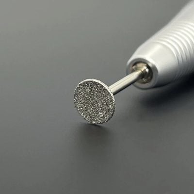 High-precision dental implant drill bit used in dental procedures for accurate implant placement and bone preparation. Stylish, durable, and essential for dental surgeries.