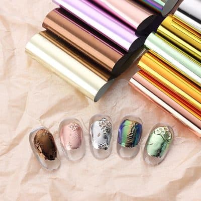Vibrant mirror nail art foils and embellishments from Monalisa Store for creating eye-catching, trendy nail designs. Perfect for professional or DIY manicures with a variety of finishes and colors.