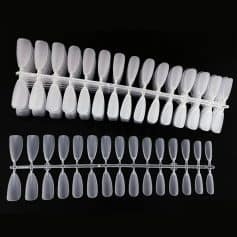 A professional nail tip display rack with clear plastic false nails for salon or clinic use, ideal for nail art, acrylic, gel, or natural nail enhancement. Perfect for showcasing nail designs.