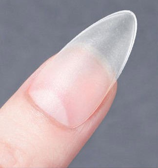 Close-up of a clear gel nail extension on a natural nail for a flawless, durable manicure. Perfect for elegant nail decor and professional nail styling.