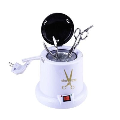 Compact sterilizer for medical tools and instruments, featuring automatic operation and safety features, ideal for clinic or salon use.