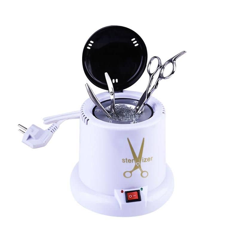 Compact sterilizer for medical tools and instruments, featuring automatic operation and safety features, ideal for clinic or salon use.