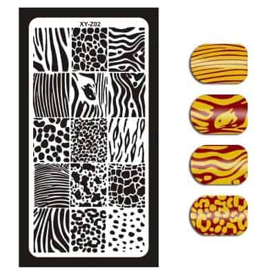 Detailed zebra print nail art design with bold patterns, perfect for stylish and unique manicures. Features black and gold animal print nail designs for trendy fashion statements.
