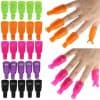 Versatile nail polish remover clips in orange, pink, purple, and black for easy nail art and removal. Reusable, lightweight, and perfect for at-home or salon use to achieve smooth, clean nails effortlessly.