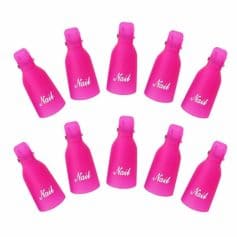 Bright pink nail polish bottles with
